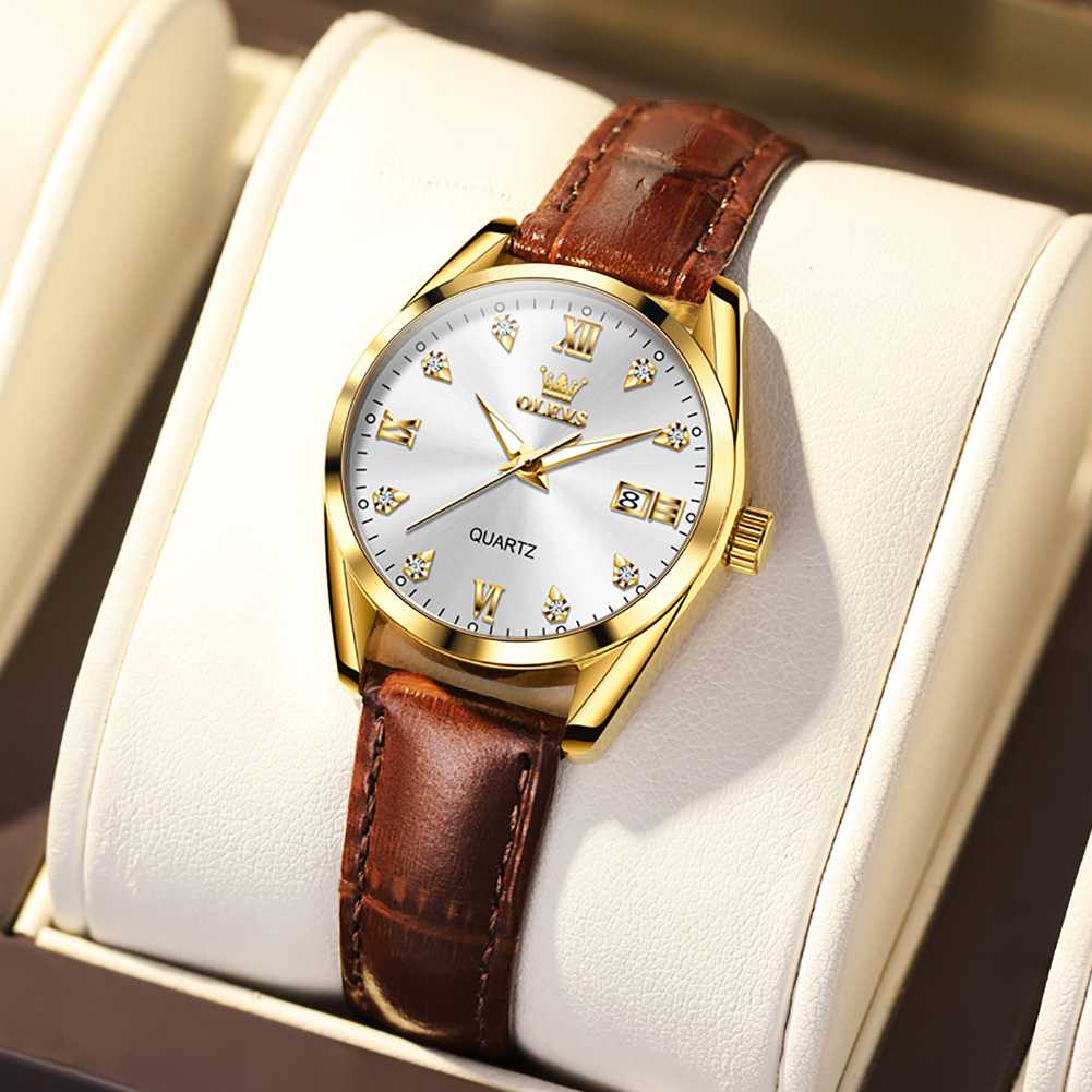 OLEVS 5522 Women's Casual Watch Features Roman Numerals, Diamonds, Leather Strap, Date Display, Quartz Movement, Waterproof Up To 3ATM