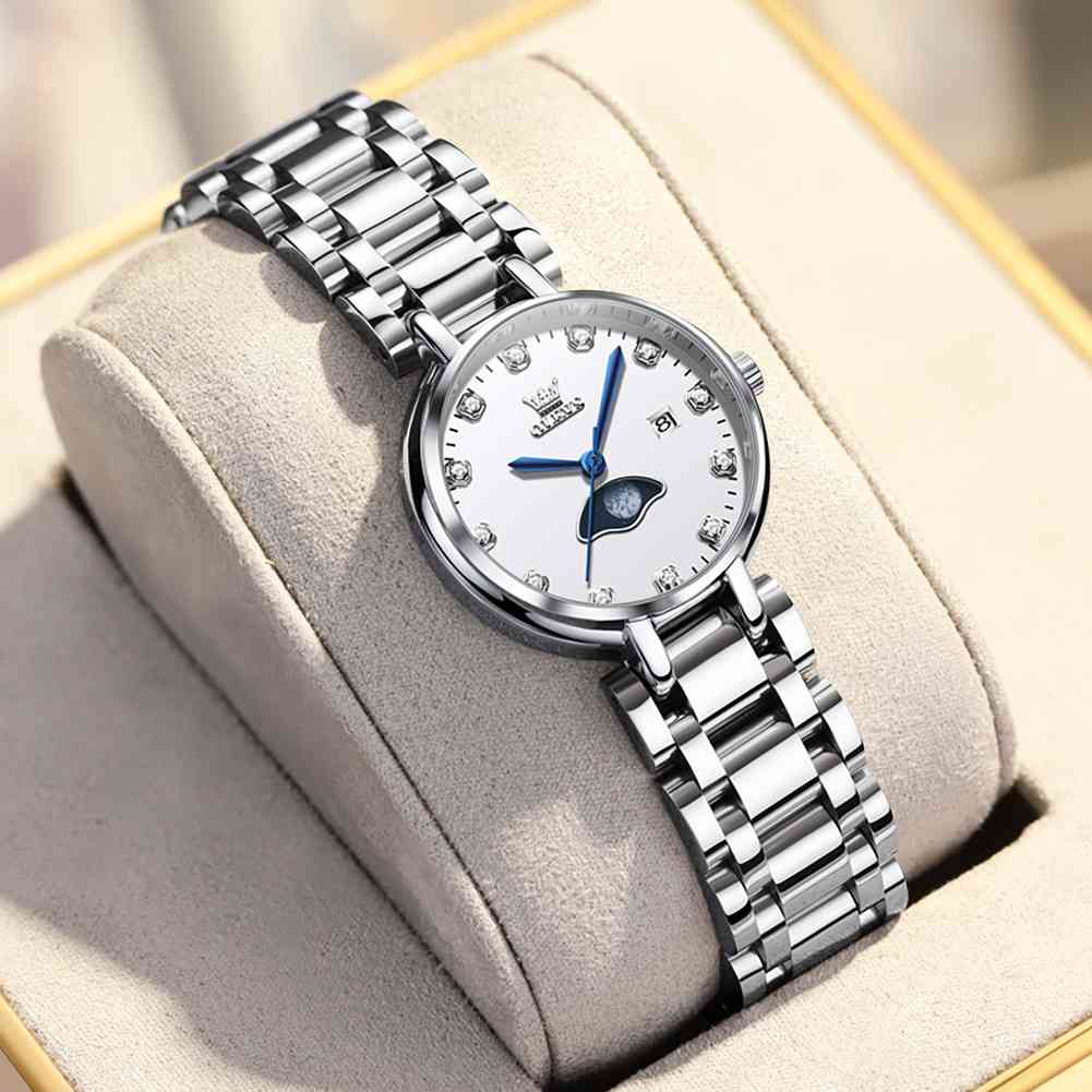 OLEVS 5573 Women's Quartz Watch With Arabic Numerals And Diamond Dial Design, Blue Hands, Date Display, 3ATM Water Resistance