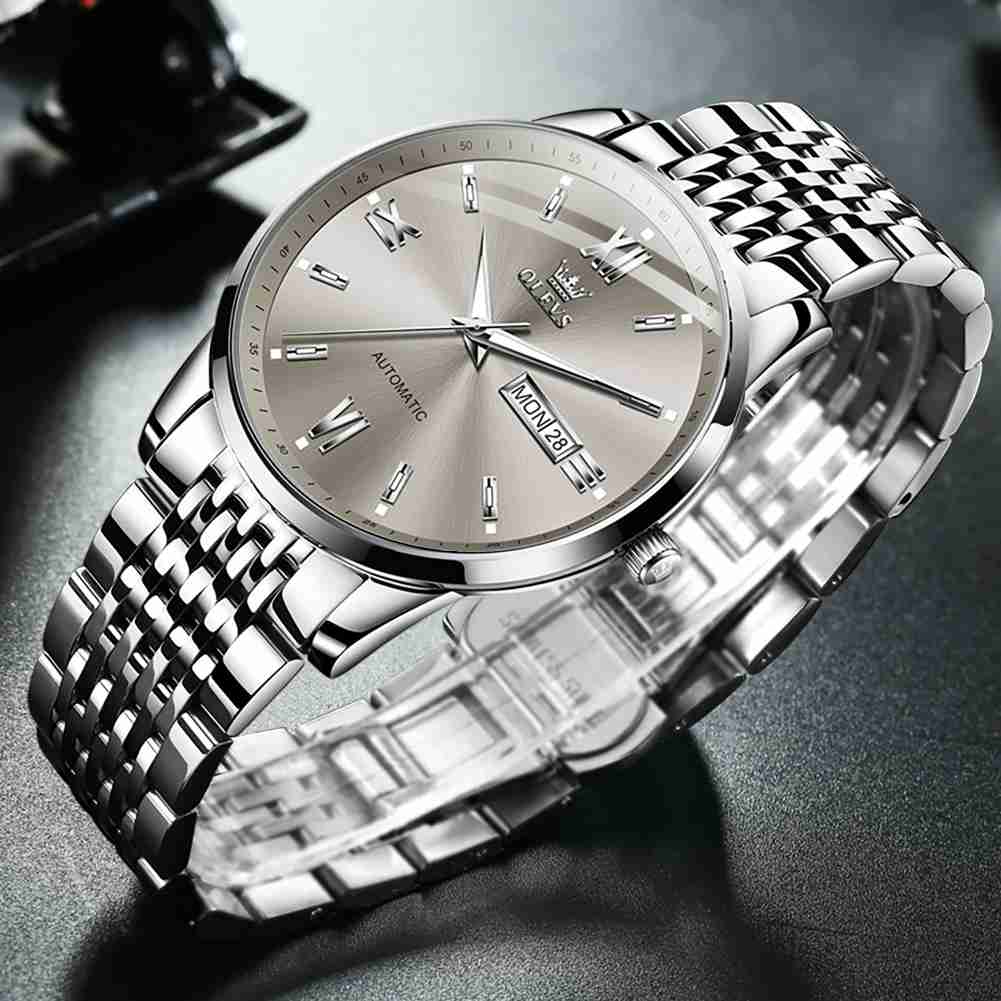 OLEVS 6777 Watch Of Men Mechanical Stainless Steel With 3ATM Water Resistance，Roman Numeral Month And Date Display