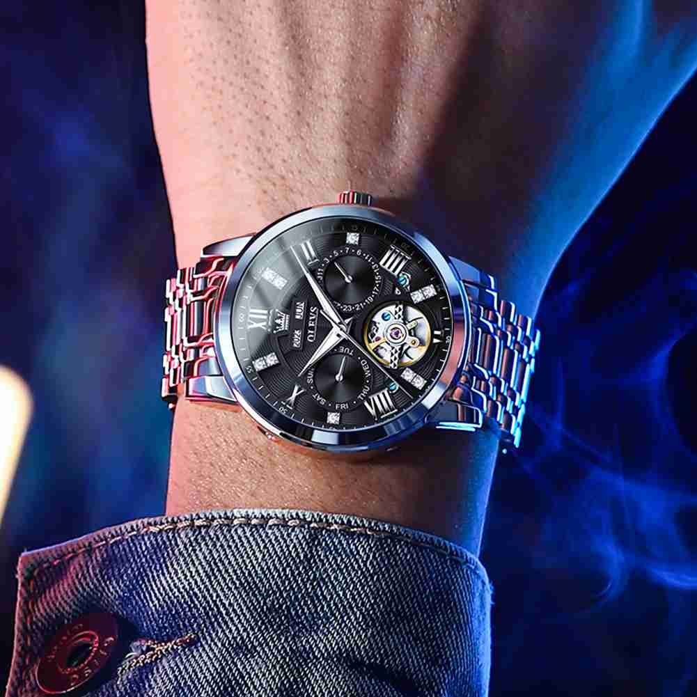 OLEVS 6701 Men's Business Mechanical Watch With Hollow Design, Annual Calendar, Luminous Hands, Waterproof 3ATM, Roman Numerals, And Diamond Accents